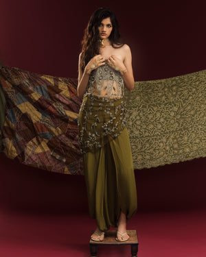Mehendi green crepe dhoti pants featuring fluid draping and sculptural gathers.
