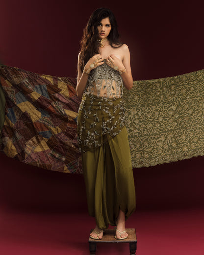 Mehendi green crepe dhoti pants featuring fluid draping and sculptural gathers.
