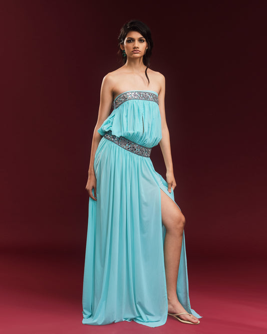 Turquoise hand-draped power mesh maxi dress featuring mirror embellishments and a high slit.