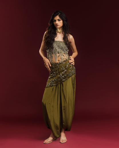 Model wearing mehendi green draped dhoti trousers with the embellished Rati Top.
